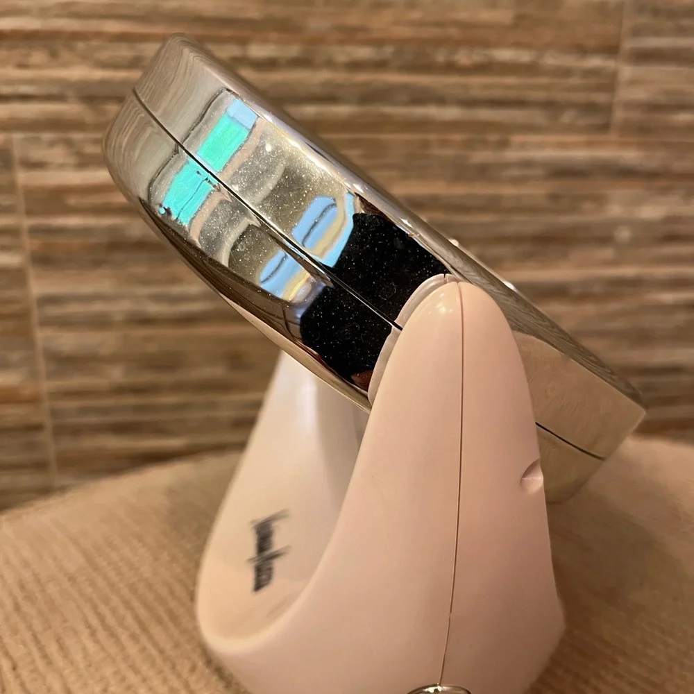 Neiman Marcus stands 8”